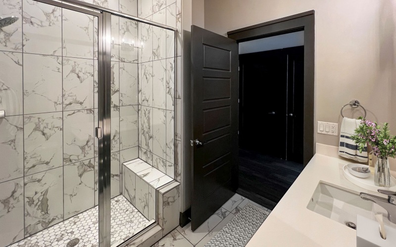 Standing shower with designer features and finishes at Residences at Capitol View