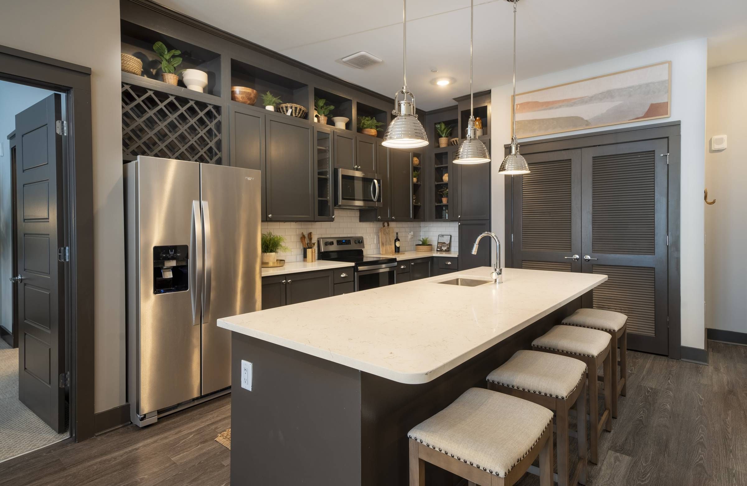 Residences at Capitol View luxury kitchen interior with stainless steel appliances