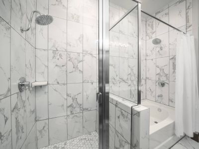 Residences at Capitol View luxury apartment bathroom with modern white tile