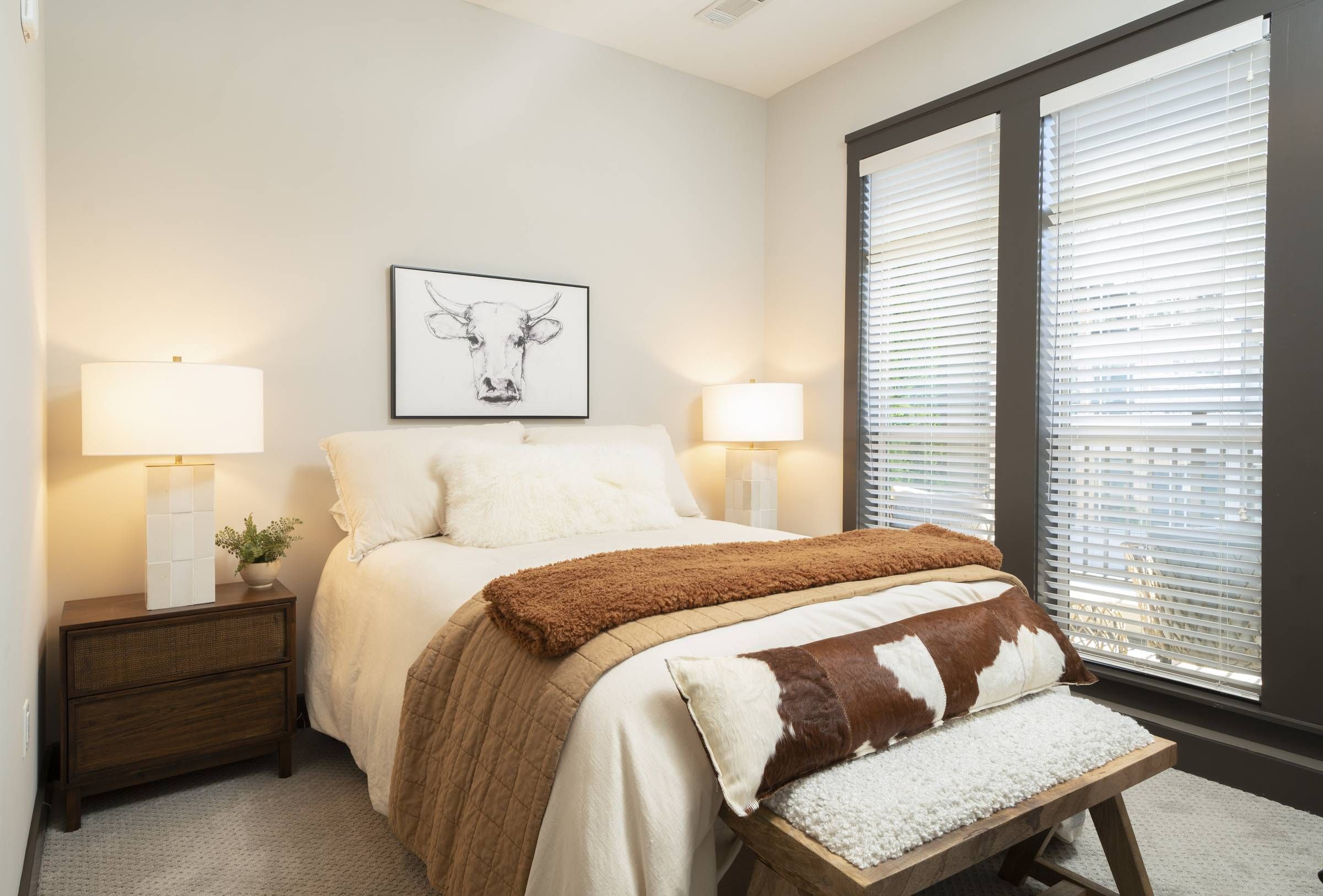 Residences at Capitol View luxury apartment bedroom with modern furnishings
