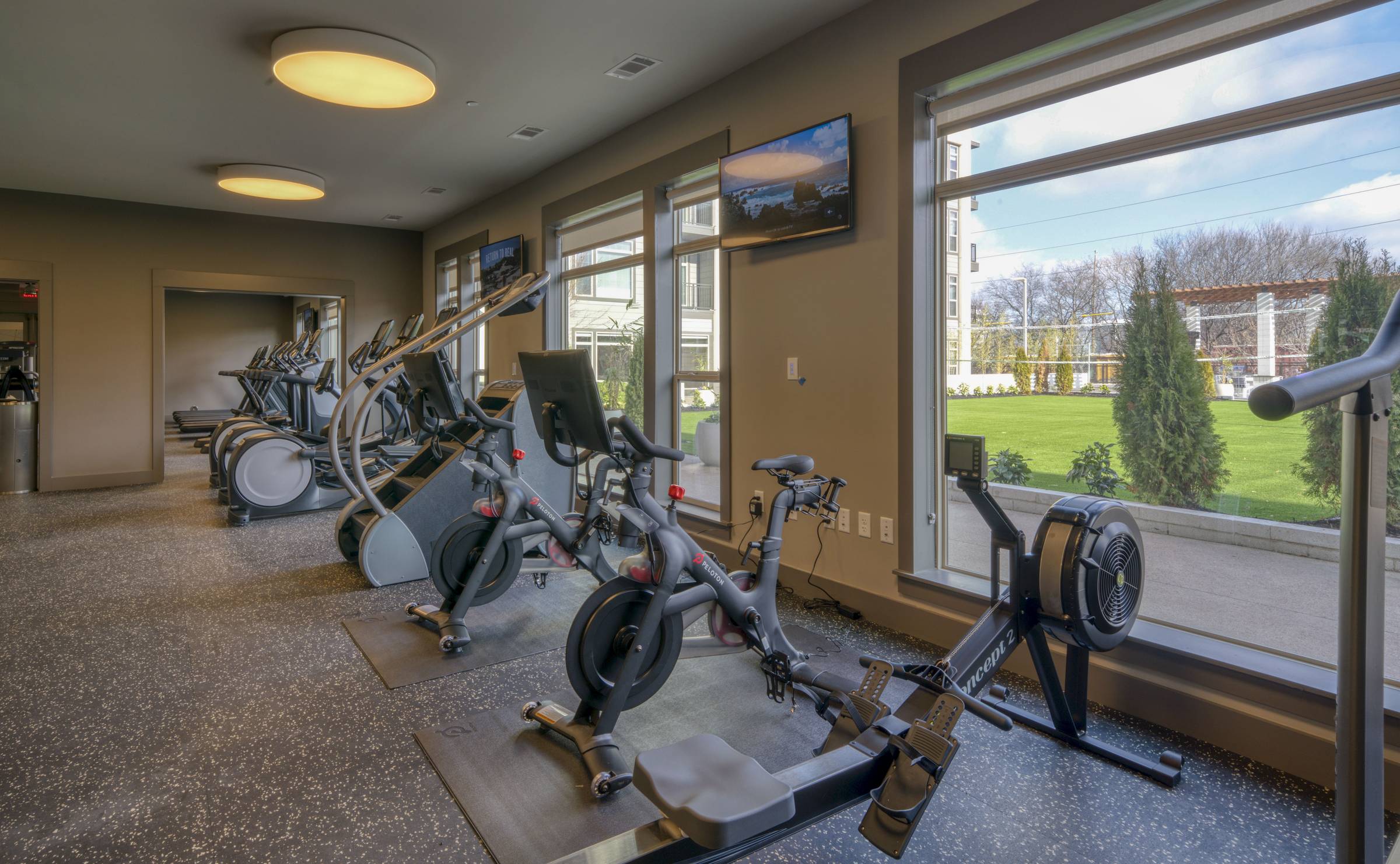 Residences at capitol view gym amenity with cardio equipment