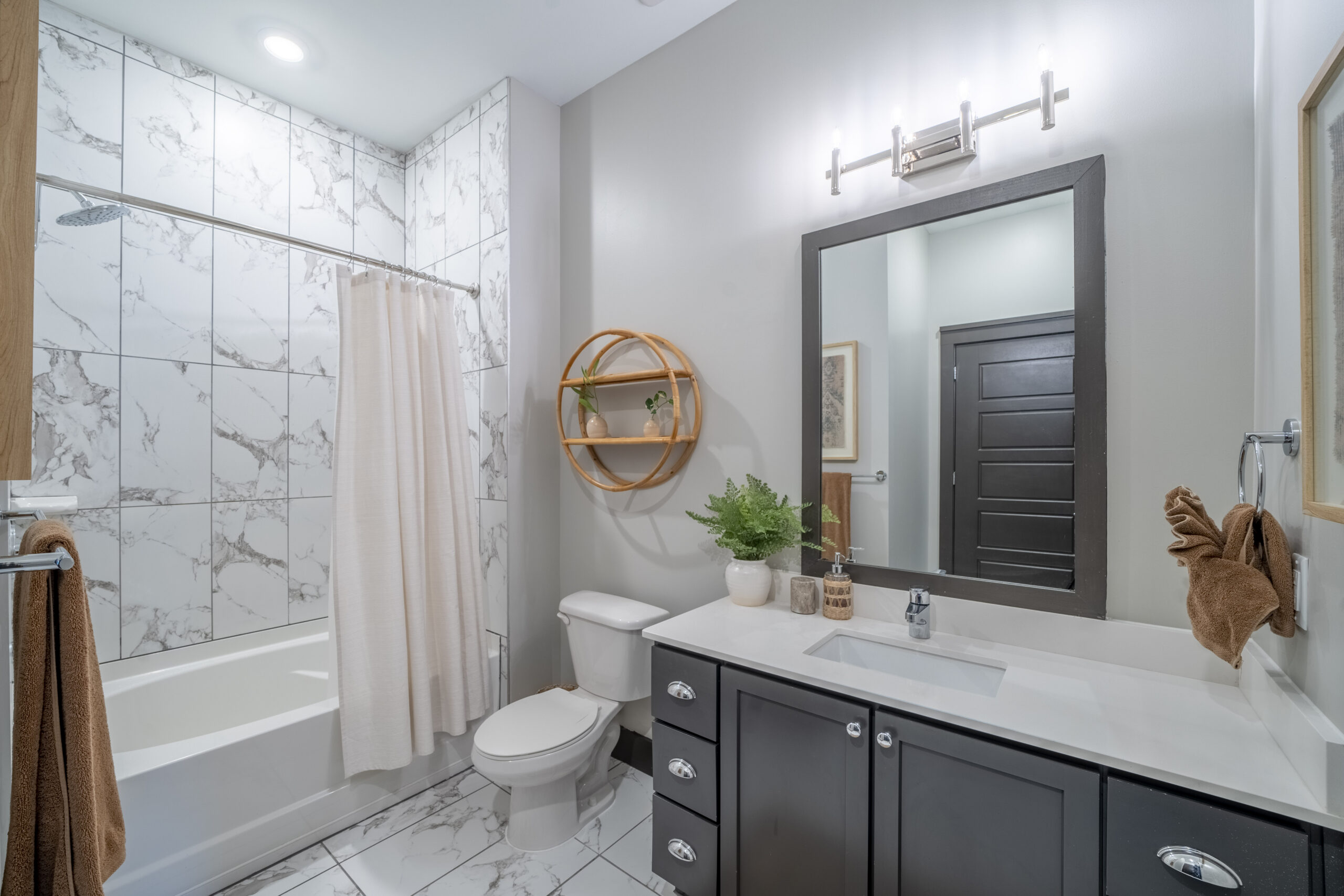 Residences at Capitol View luxury apartment bedroom with modern furnishings